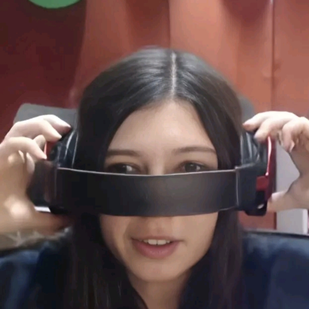 woman_headphones_eyes_covered